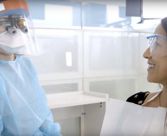 Patient in clinic (video still)